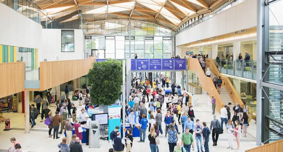 A crowd of visitors in the Forum on Streatham Campus for an Open Day