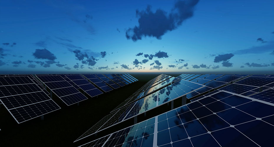 Sunset, over an array of solar panels, which stretch to the horizon, suggestive of the future of clean energy.