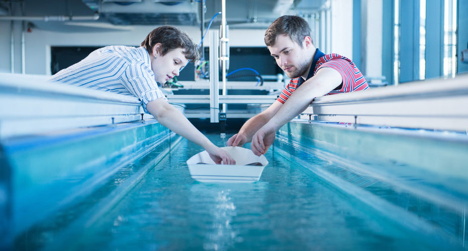Students experimenting in water