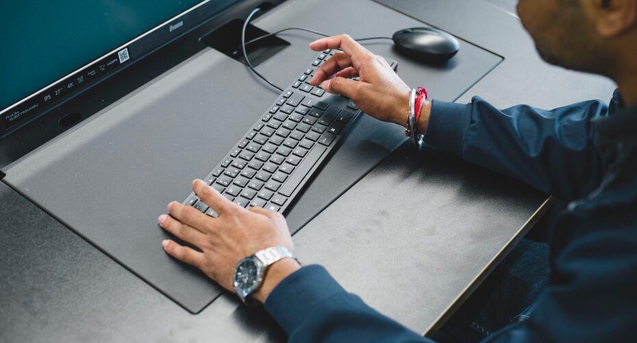 A man working at a PC