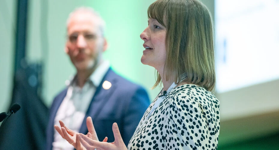 Woman speaks on stage at THE Conference Digital Universities UK